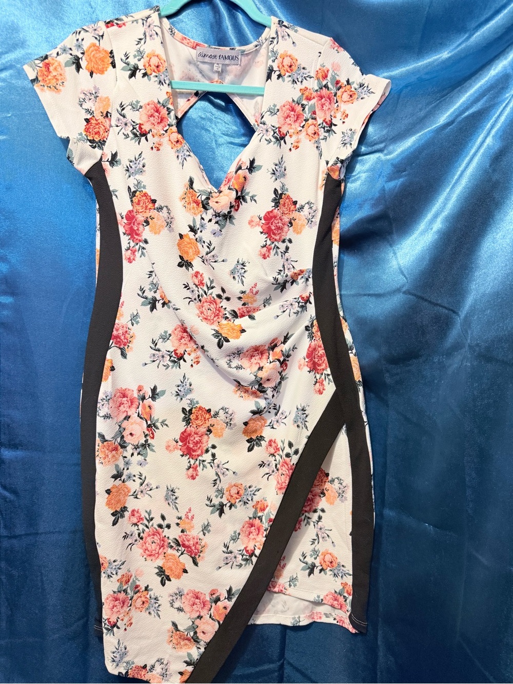Sexy floral dress with black outline.
